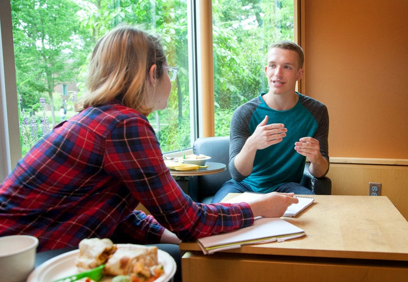 Photo of students utilizing study lounge in Living-Learning Center