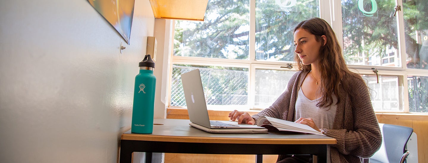 Student studies in their room