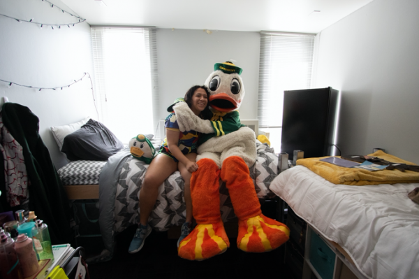 The Duck and a student in a residence hall room